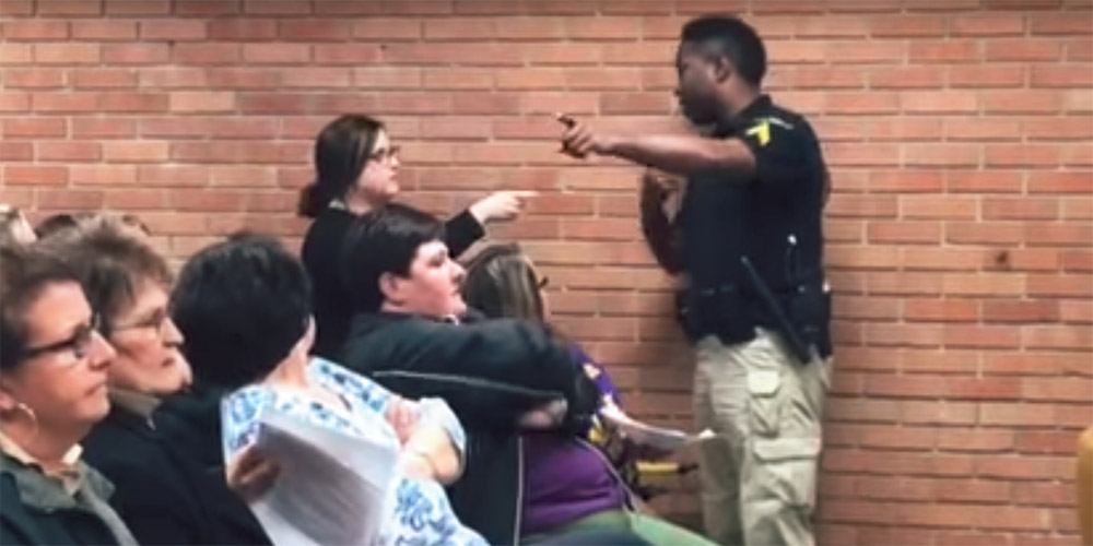 Teacher Arrested at Board Meeting